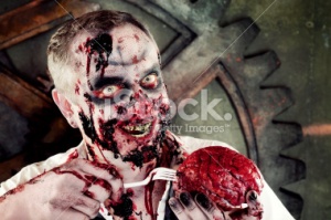 stock-photo-18123810-bloody-zombie-eating-brains